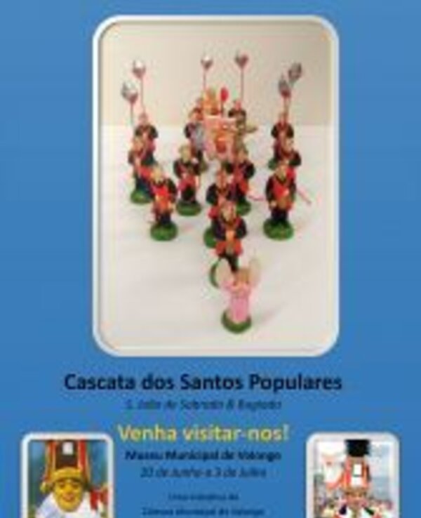 Figuras em miniatura de dançarinos com balões, promovendo evento cultural.