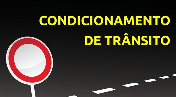 Sinal de trânsito com a frase 'Condicionamento de Trânsito' em fundo escuro.