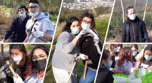 Grupo de jovens a trabalhar na natureza, com ferramentas e sorrisos.